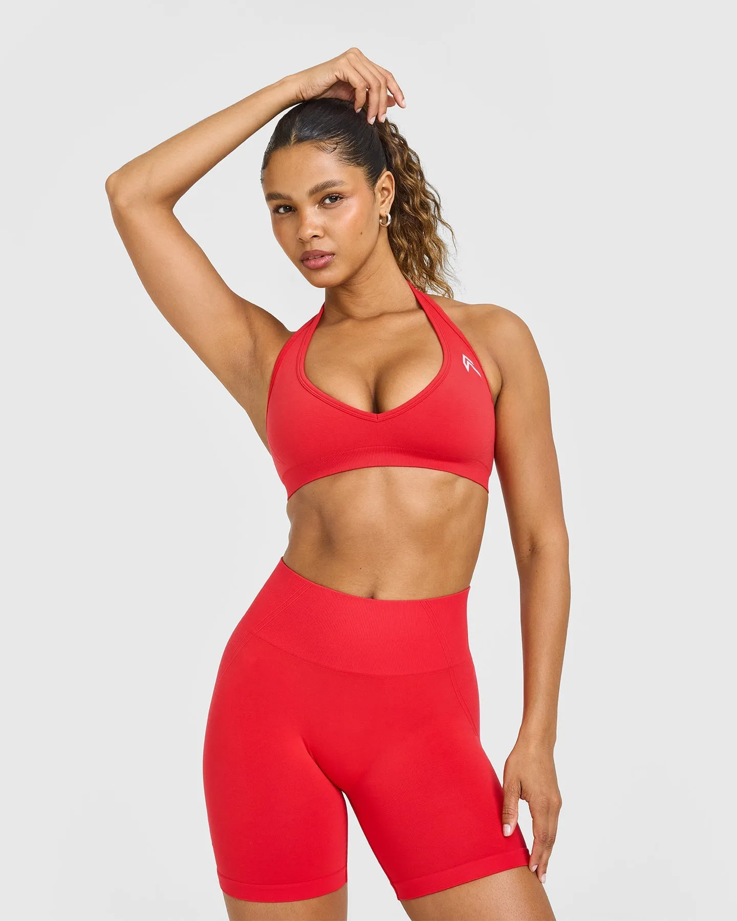 EffortlessLift™ Seamless Halter Neck Sports Bra with White Logo | Muscle Mommy Red sold by Oner Active