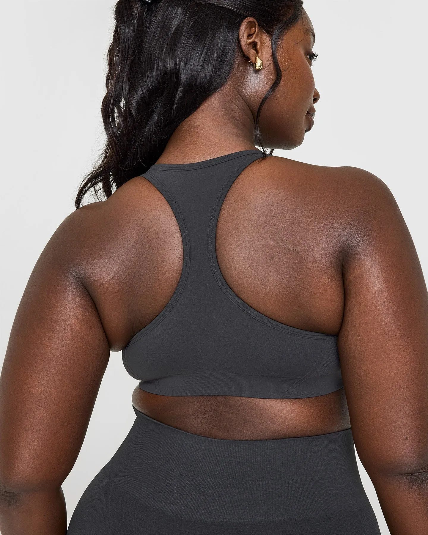 EffortlessLift™ Seamless Racer Back Sports Bra with White Logo | Coal sold by Oner Active product image thumbnail 4