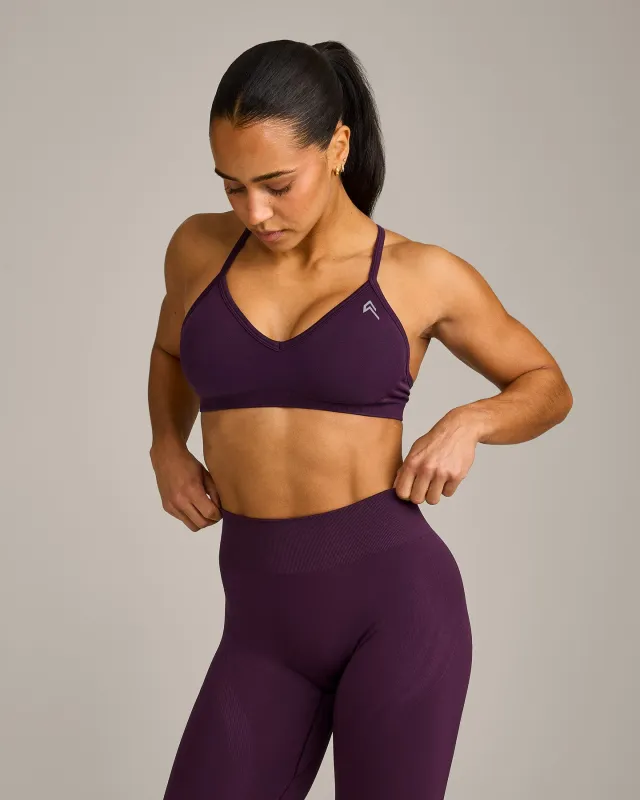EnhanceLift™ Seamless Strappy Sports Bra with Grey Logo | Blackberry Purple made by Oner Active
