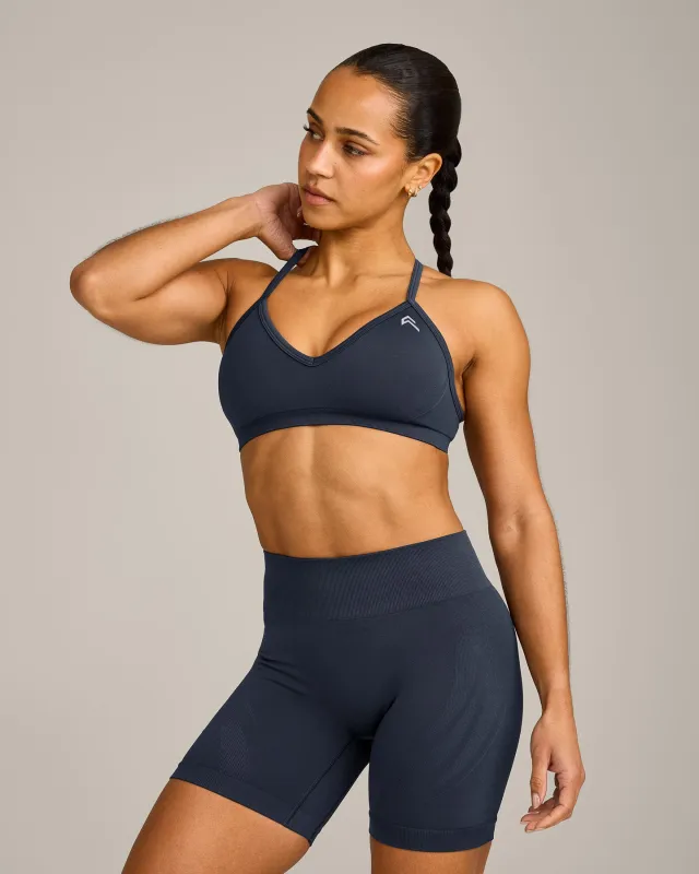 EnhanceLift™ Seamless Strappy Sports Bra with Grey Logo | True Blue sold by Oner Active