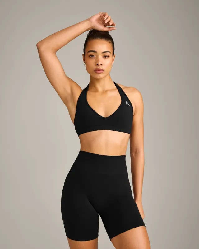EffortlessLift™ Seamless Halter Neck Sports Bra with Grey Logo | Black made by Oner Active