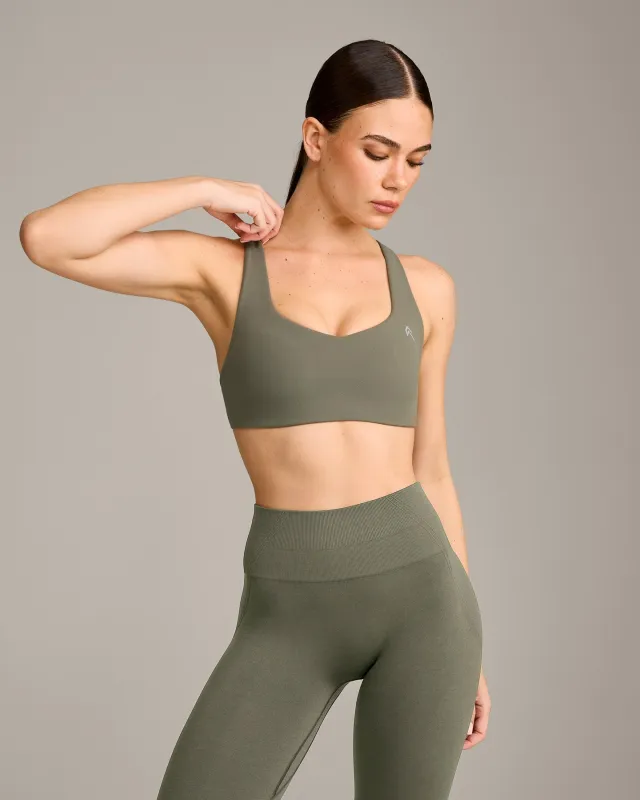 EasyLift™ Cross Back Sports Bra with Grey Logo | Alpine Green made by Oner Active