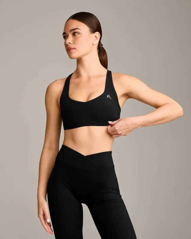 EasyLift™ Cross Back Sports Bra with Grey Logo | Black sold by Oner Active