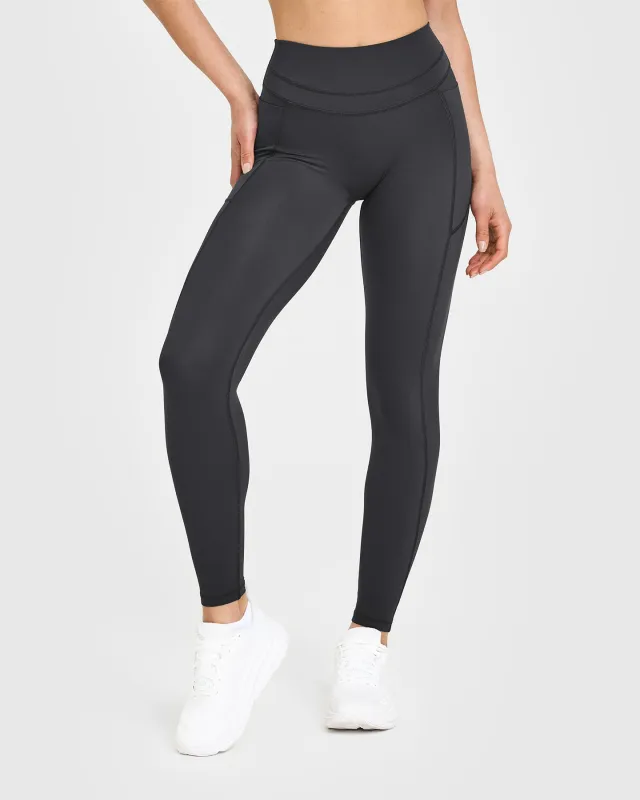 UnifiedMove High Waisted Pocket Leggings | Coal sold by Oner Active