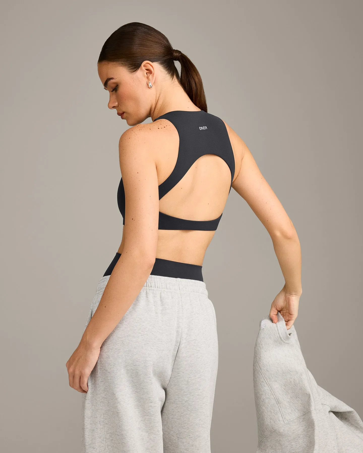 SoftMotion™ High Neck Sports Bra with Grey Logo | Coal sold by Oner Active product image thumbnail 2