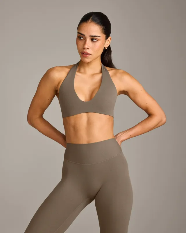 SoftMotion™ Minimal Halter Neck Bralette with Grey Logo | Moss Brown sold by Oner Active