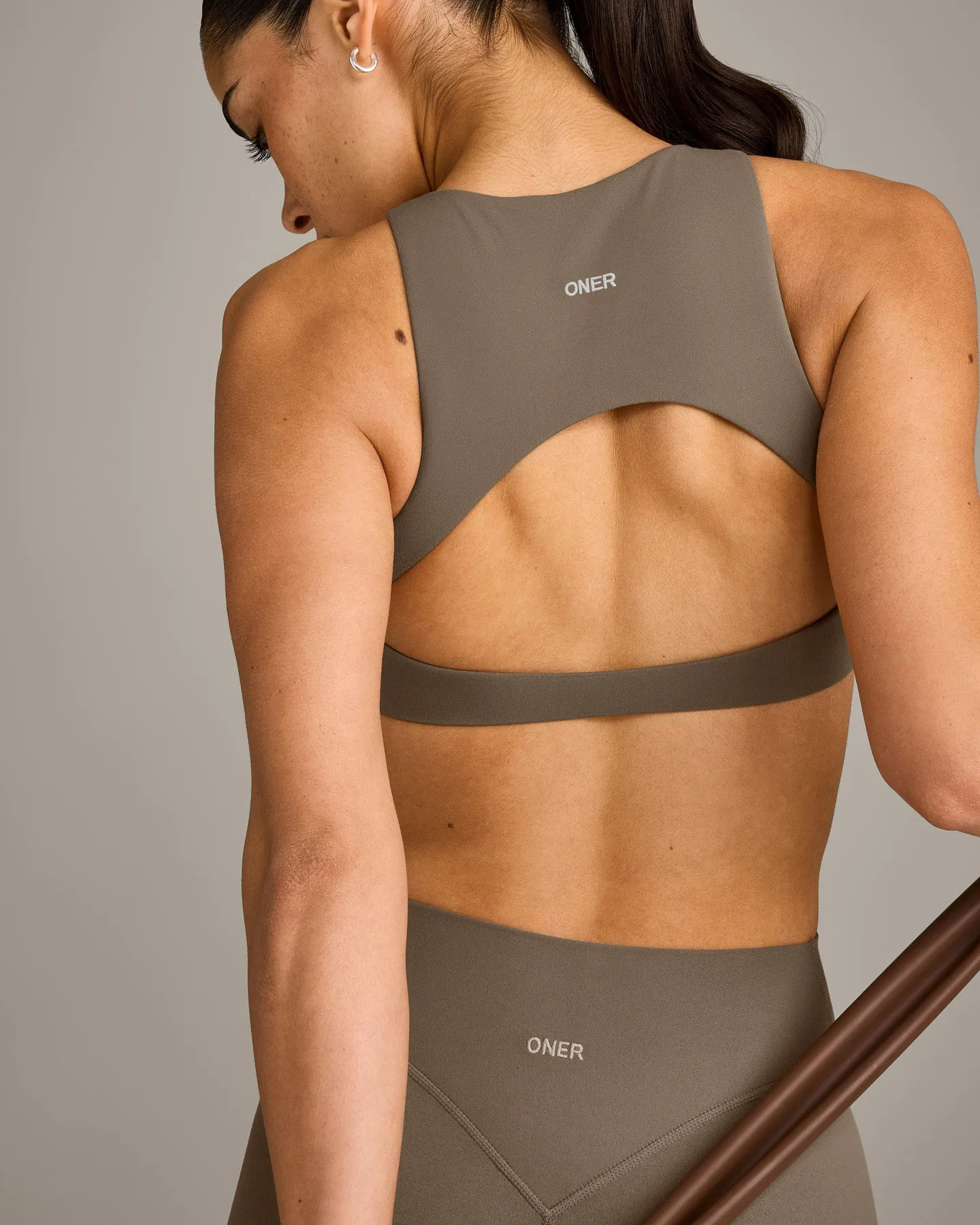 SoftMotion™ High Neck Sports Bra with Grey Logo | Moss Brown sold by Oner Active product image thumbnail 5