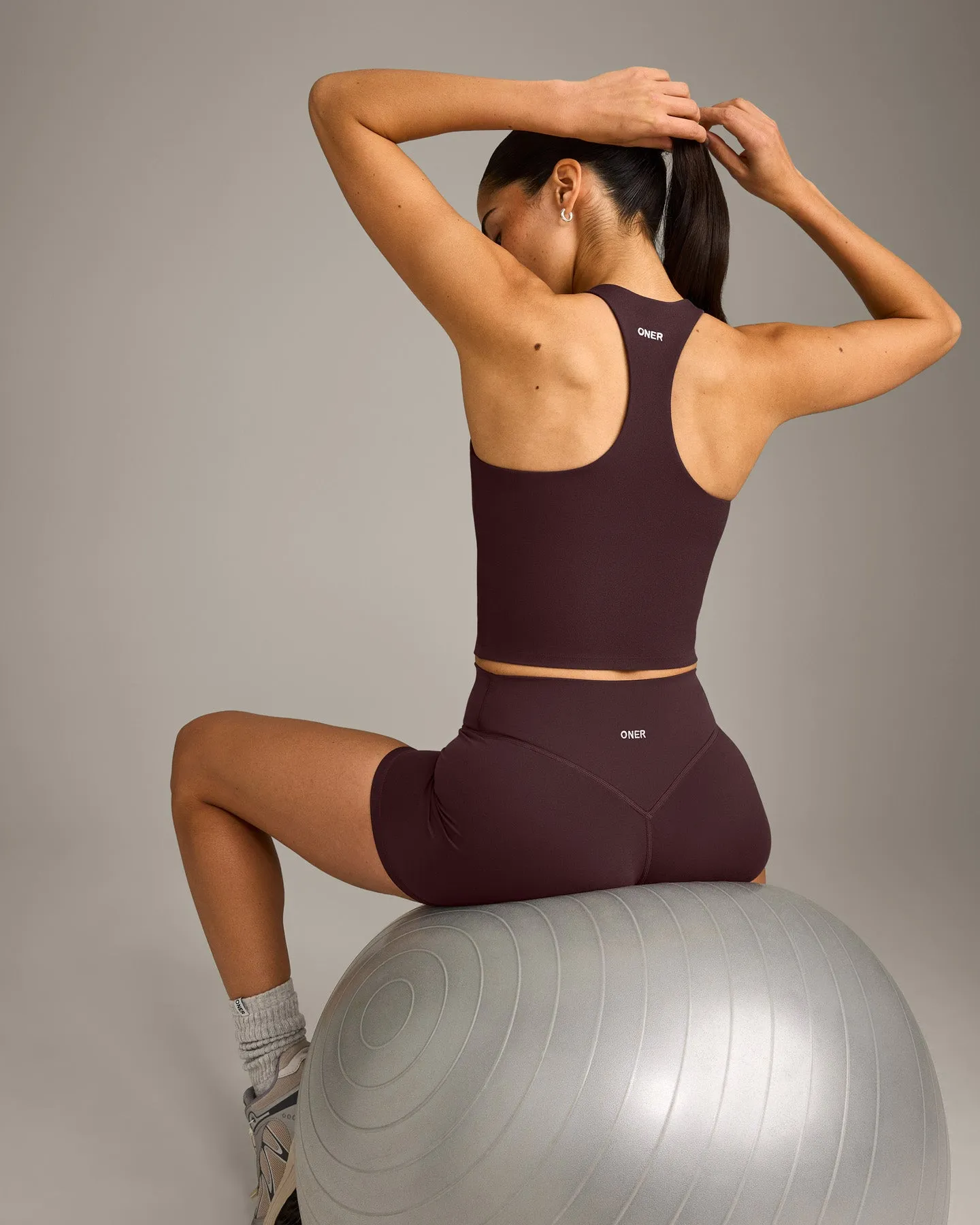 SoftMotion™ Racer Back Mid Vest with Built in Bra Shelf with Grey Logo | Plum Brown sold by Oner Active product image thumbnail 2