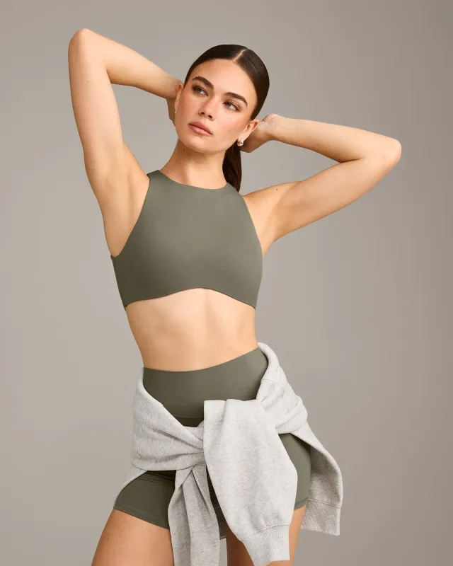 SoftMotion™ High Neck Sports Bra with Grey Logo | Alpine Green sold by Oner Active