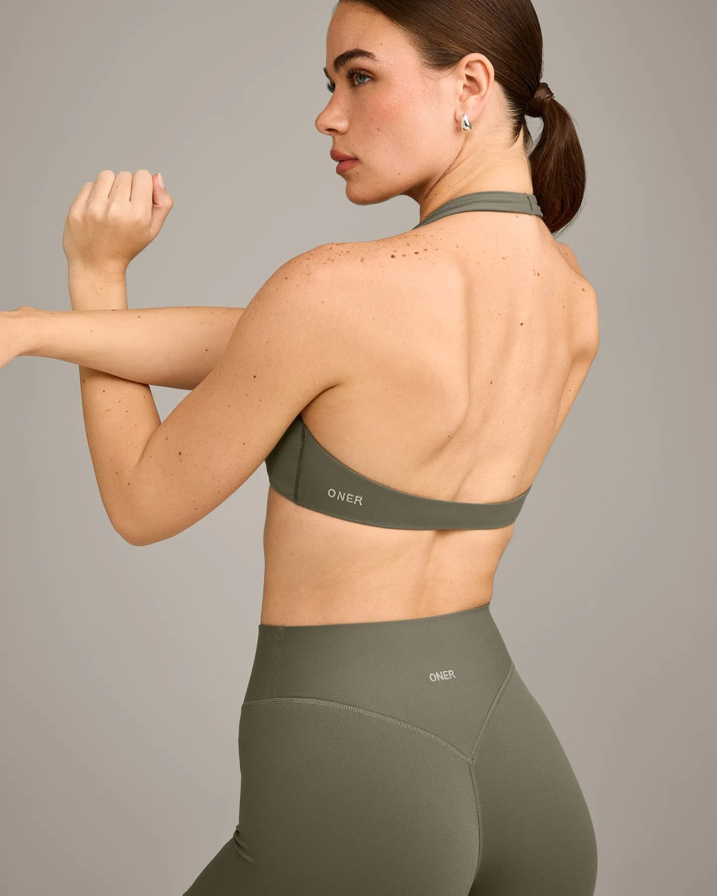 SoftMotion™ Minimal Halter Neck Bralette with Grey Logo | Alpine Green sold by Oner Active product image thumbnail 2