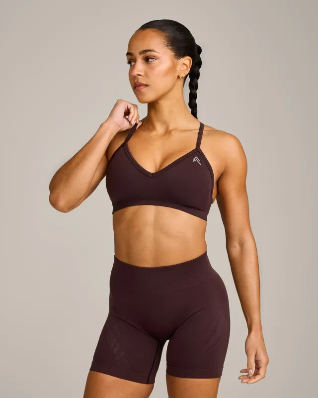 EnhanceLift™ Seamless Strappy Sports Bra with Grey Logo | Plum Brown made by Oner Active