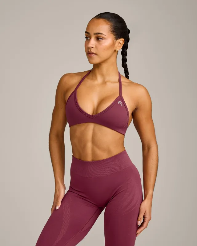 EnhanceLift™ Seamless Minimal Halter Neck Bralette with Grey Logo | Burnt Maroon made by Oner Active
