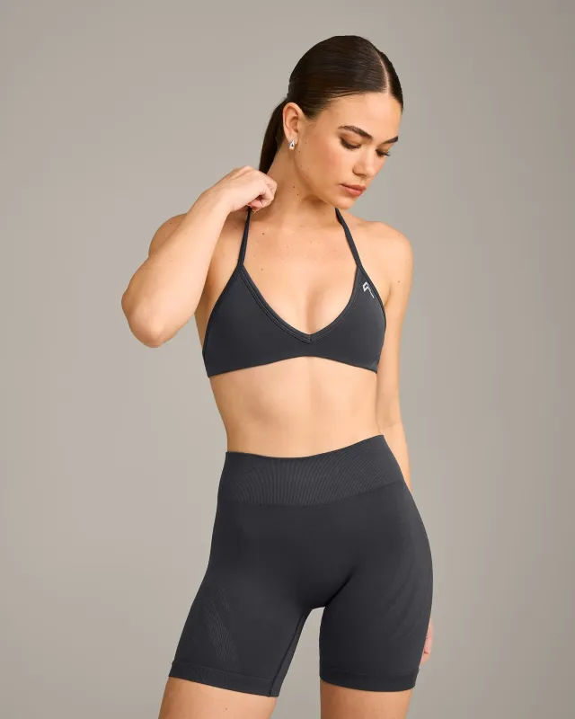 EnhanceLift™ Seamless Minimal Halter Neck Bralette with Grey Logo | Coal made by Oner Active