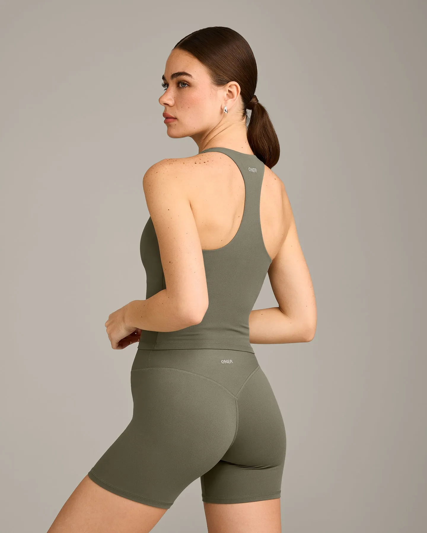 SoftMotion™ Racer Back Mid Vest with Built in Bra Shelf with Grey Logo | Alpine Green sold by Oner Active product image thumbnail 2