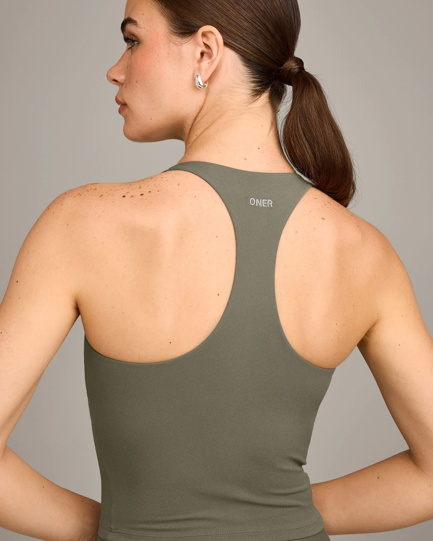 SoftMotion™ Racer Back Mid Vest with Built in Bra Shelf with Grey Logo | Alpine Green sold by Oner Active product image thumbnail 4