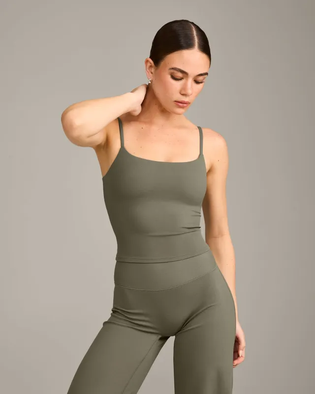 SoftMotion™ Strappy Mid Vest with Built in Bra Shelf with Grey Logo | Alpine Green sold by Oner Active