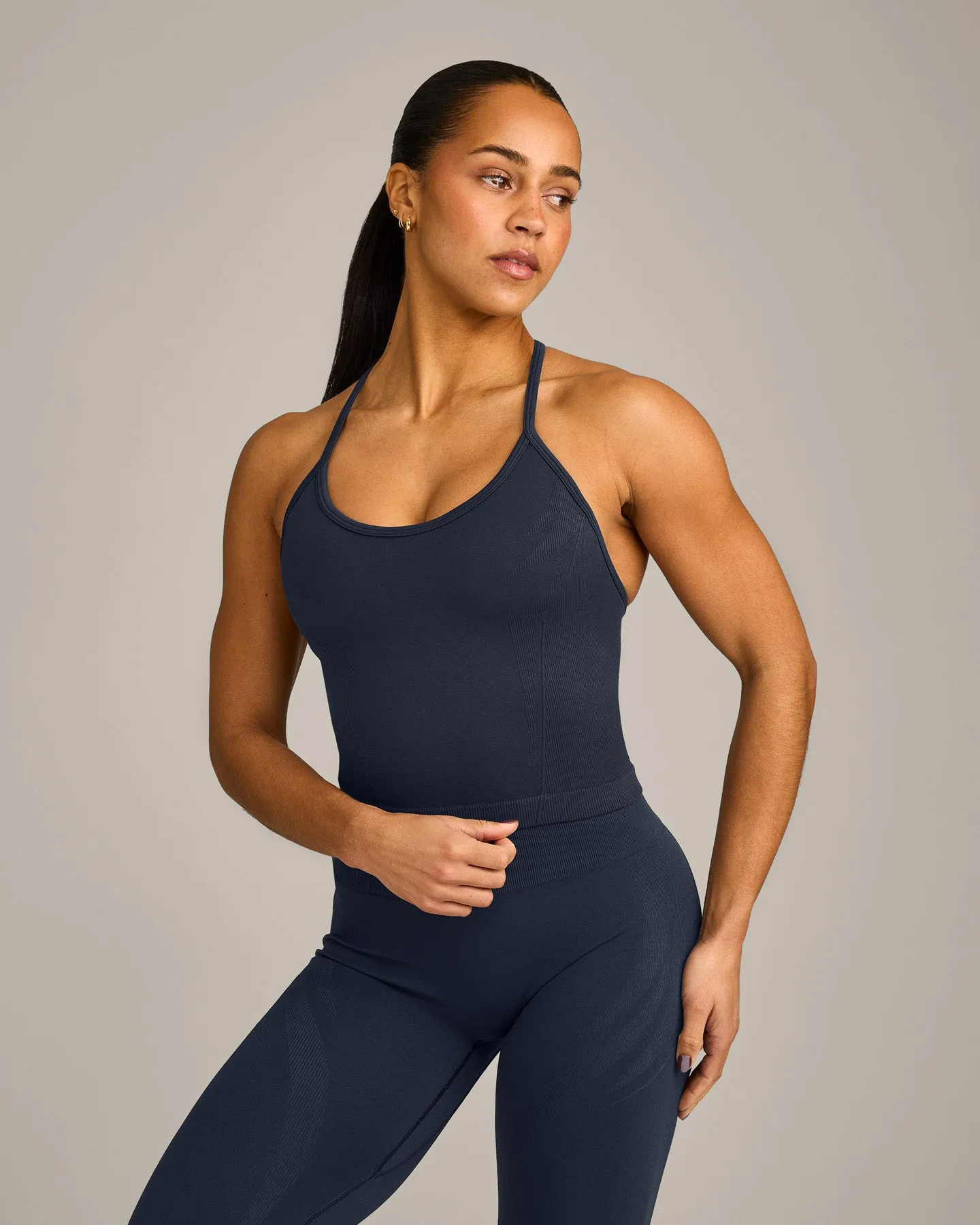 EnhanceLift™ Seamless Strappy Racer Vest with Built in Bra Shelf with Grey Logo | True Blue sold by Oner Active