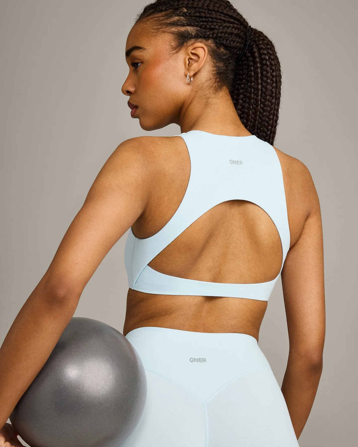 SoftMotion™ High Neck Sports Bra with Grey Logo | Cloud Blue sold by Oner Active product image thumbnail 4