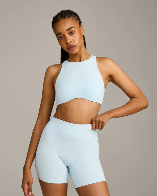 SoftMotion™ High Neck Sports Bra with Grey Logo |  Cloud Blue made by Oner Active