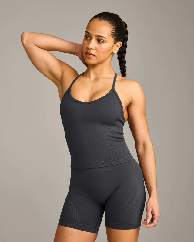 EnhanceLift™ Seamless Strappy Racer Vest with Built in Bra Shelf with Grey Logo | Coal made by Oner Active