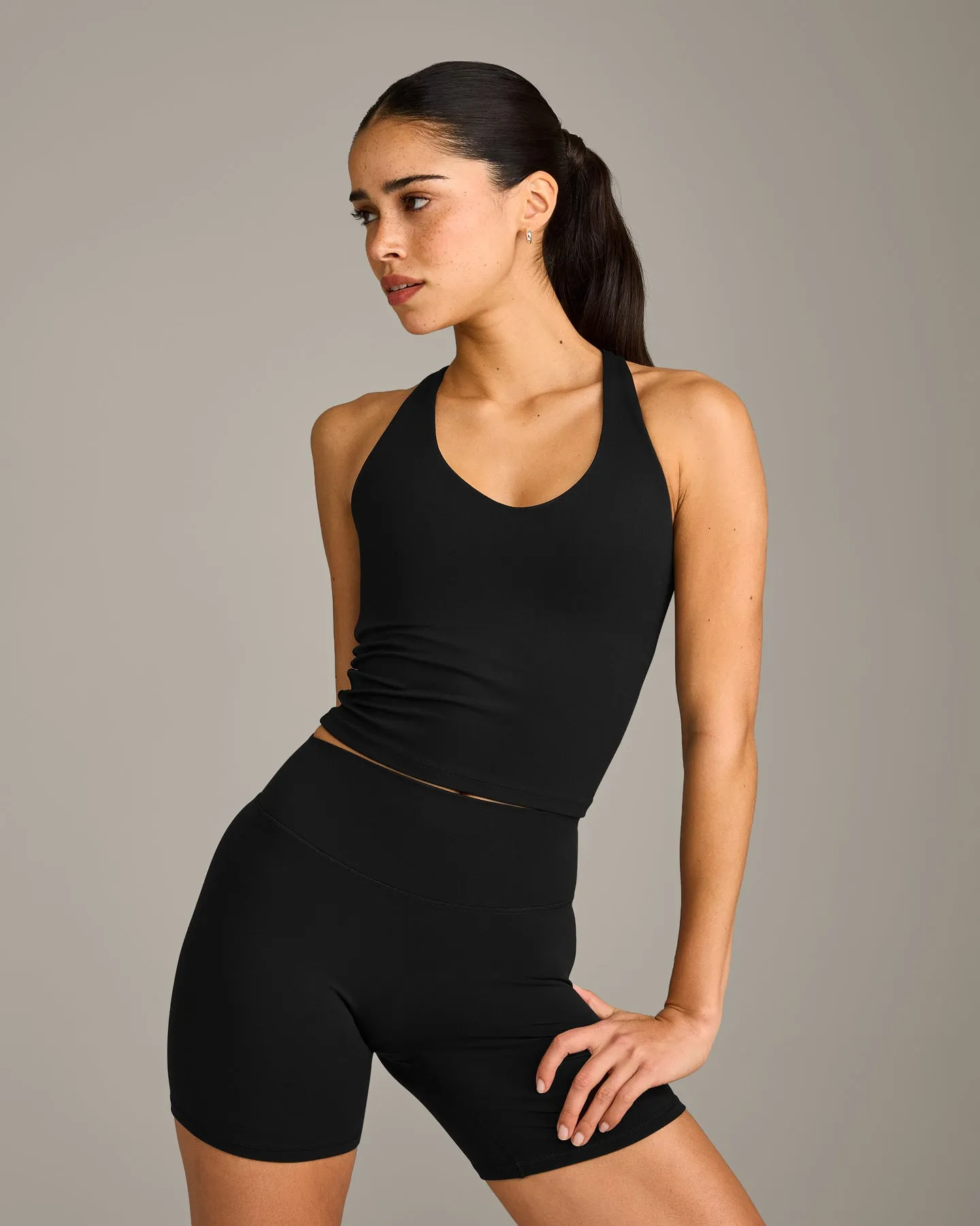 SoftMotion™ Racer Back Mid Vest with Built in Bra Shelf with Grey Logo | Black sold by Oner Active