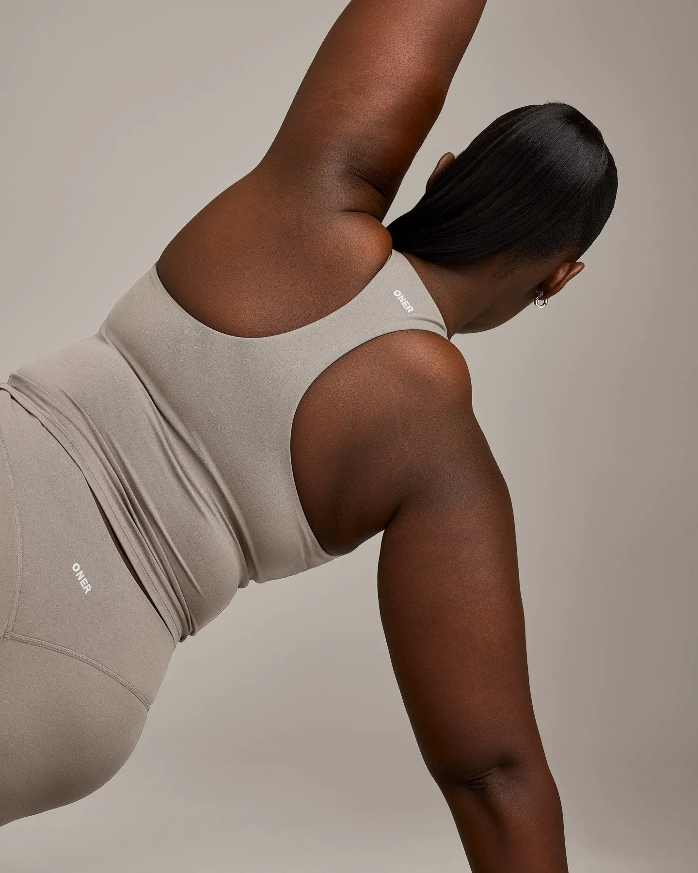 SoftMotion™ Racer Back Mid Vest with Built in Bra Shelf with White Logo | Warm Sand sold by Oner Active product image thumbnail 5