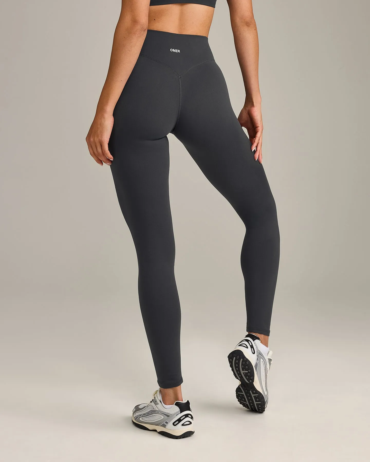SoftMotion™ High Waisted Leggings with Grey Logo | Coal sold by Oner Active