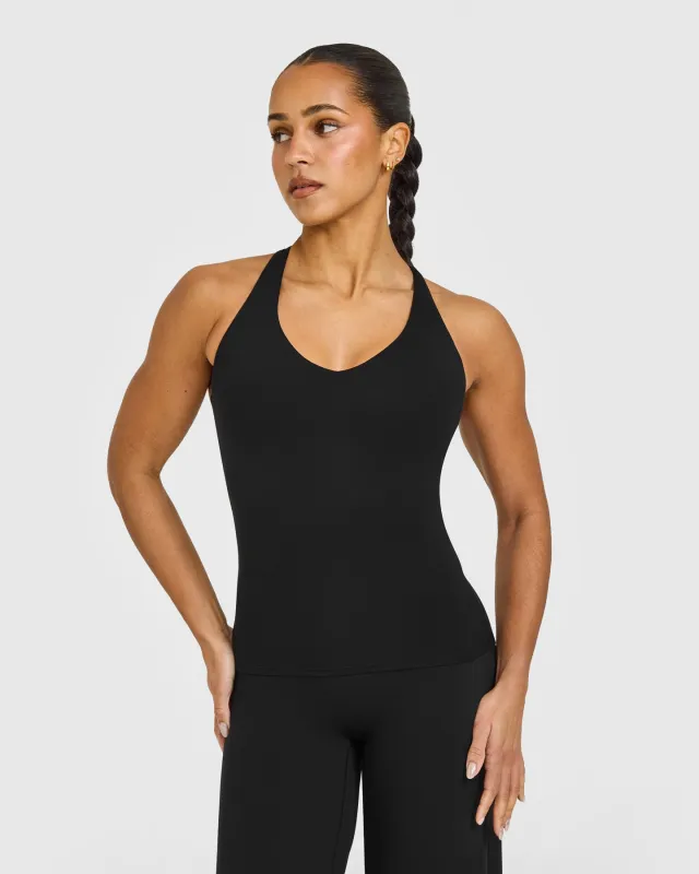 SoftMotion™ Racer Back Vest with Built in Bra Shelf with White Logo | Black made by Oner Active