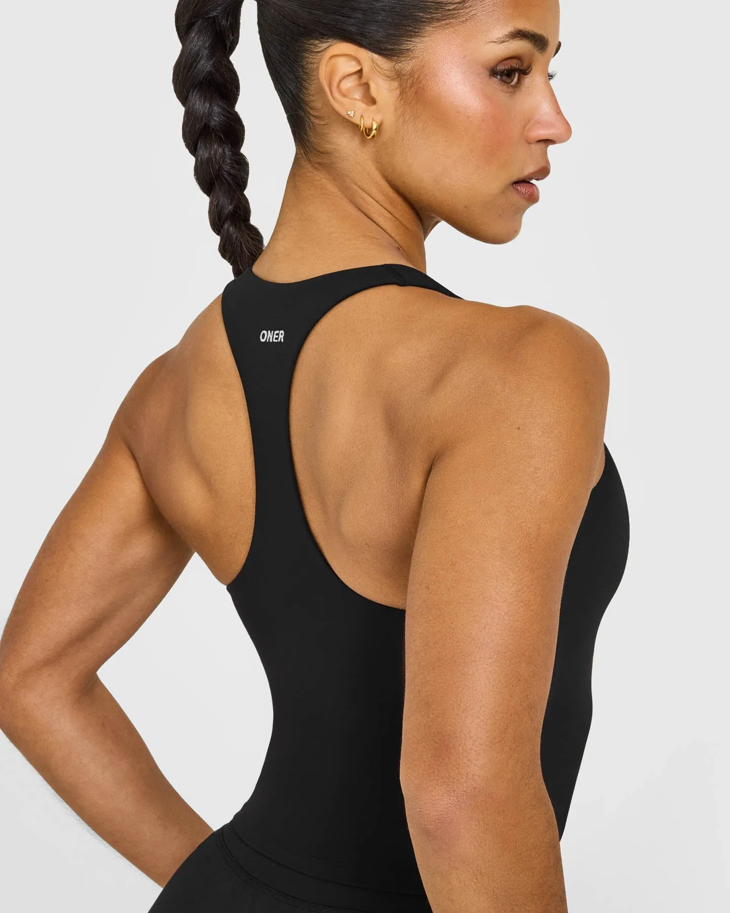SoftMotion™ Racer Back Mid Vest with Built in Bra Shelf with White Logo | Black sold by Oner Active product image thumbnail 4