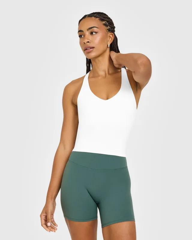 SoftMotion™ Racer Back Mid Vest With Built in Bra Shelf | White made by Oner Active