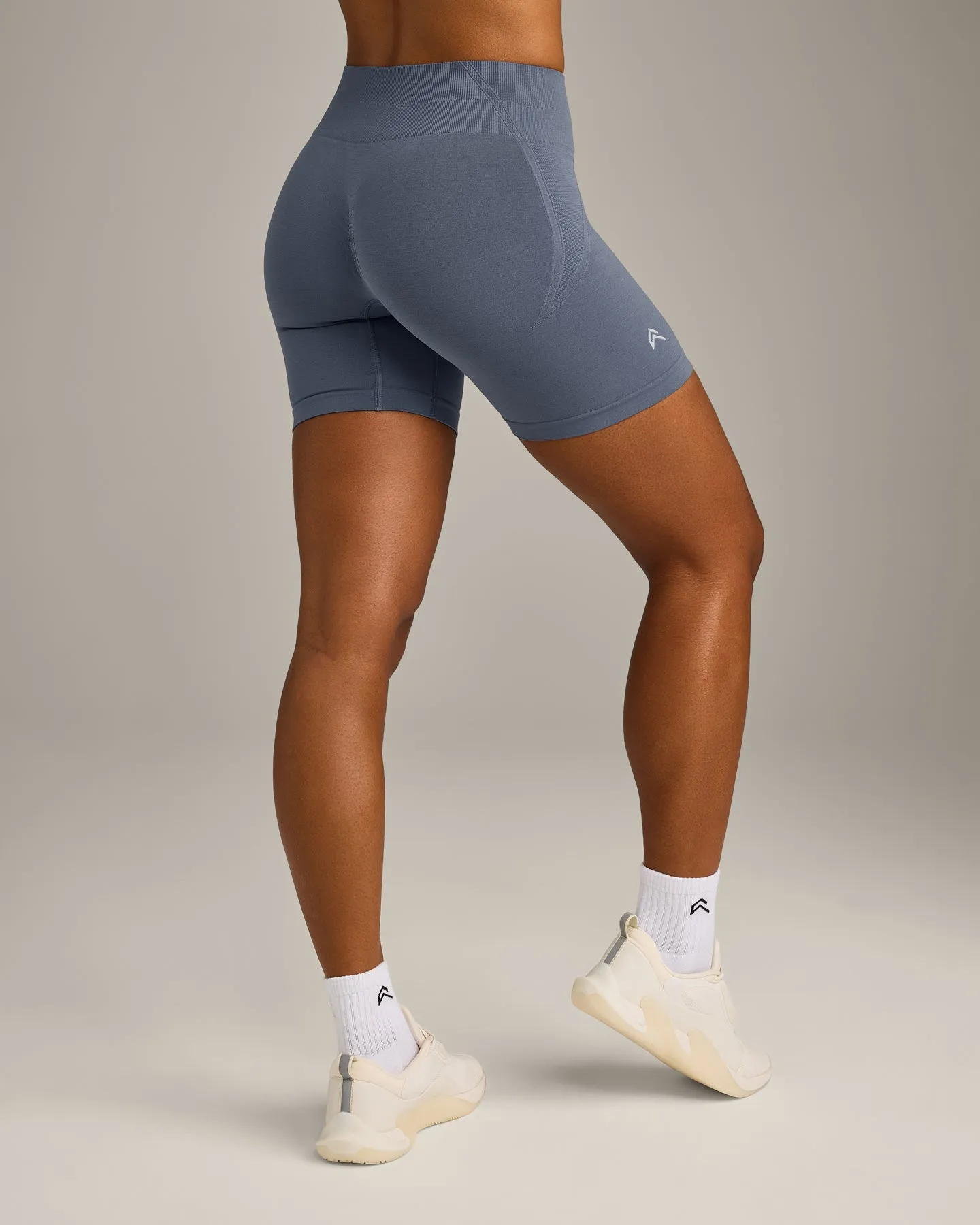 EffortlessLift™ Seamless Mid Rise Shorts with Grey Logo | Light Granite Blue sold by Oner Active