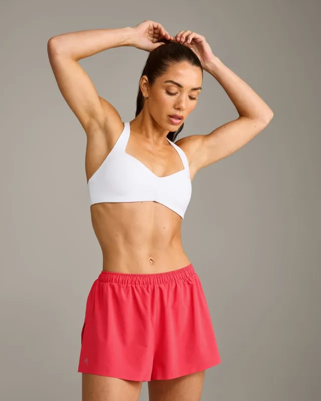 UnifiedMove™ T Back Minimal Bralette with Reflective Logo | White made by Oner Active