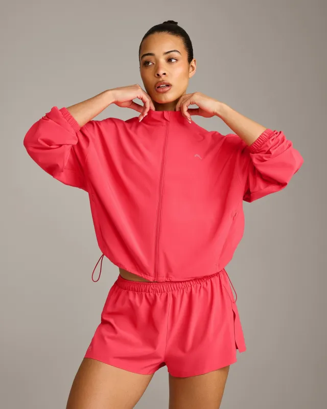 AirMove™ Jacket with Bonding with Reflective Logo | Charged Pink made by Oner Active
