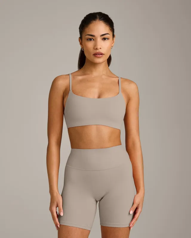 SoftMotion™ Strappy Sports Bra with White Logo | Warm Sand made by Oner Active