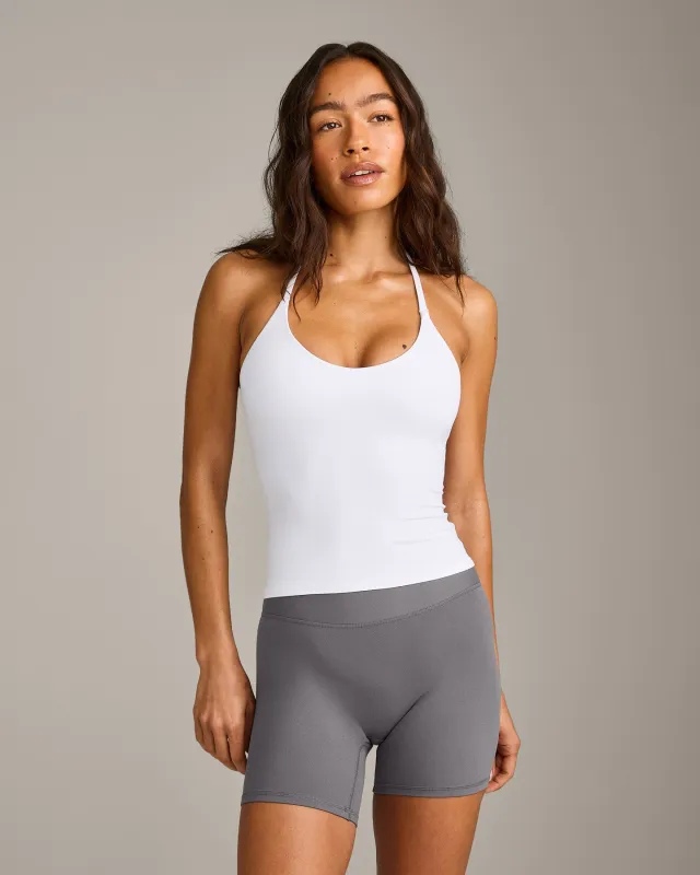 SoftMotion™ Strappy Halter Neck Vest with Built in Bra Shelf with Grey Logo | White made by Oner Active