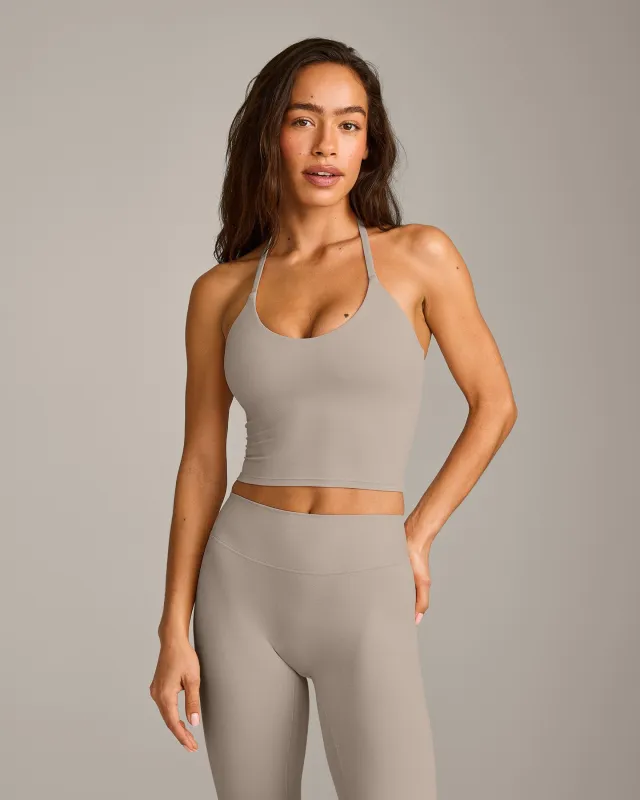 SoftMotion™ Strappy Halter Neck Mid Vest with Built in Bra Shelf with White Logo | Warm Sand made by Oner Active