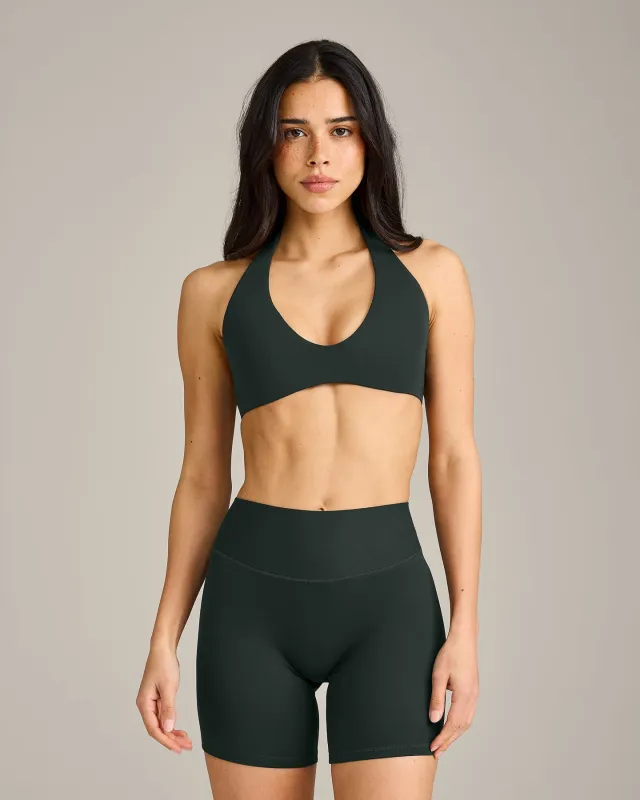 SoftMotion™ Minimal Halter Neck Bralette with Grey Logo | Emerald Noir made by Oner Active