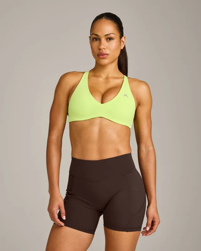 UnifiedMove™ Cross Back Sports Bra with Reflective Logo | Citrus Green made by Oner Active