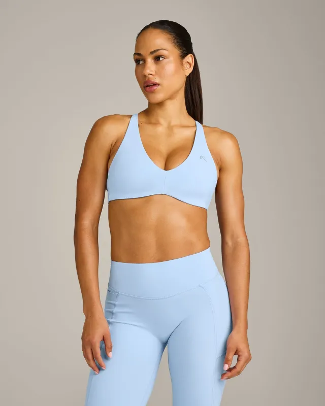 UnifiedMove™ Cross Back Sports Bra with Reflective Logo | Powdered Blue made by Oner Active