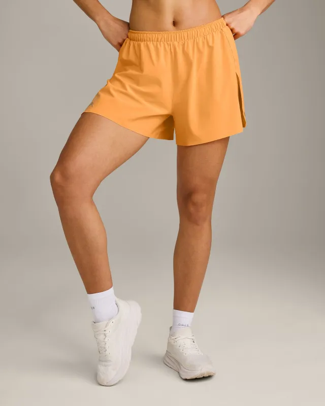 AirMove™ Lined Shorts 4" with Pocket and Reflective Logo | Powdered Orange made by Oner Active