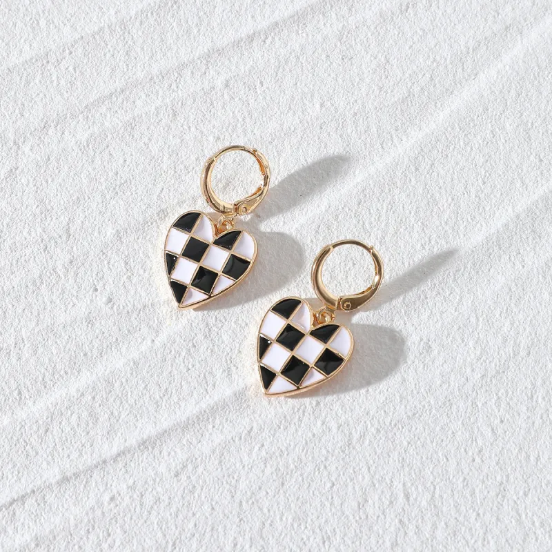 Luv Check Earrings sold by Empty Soda