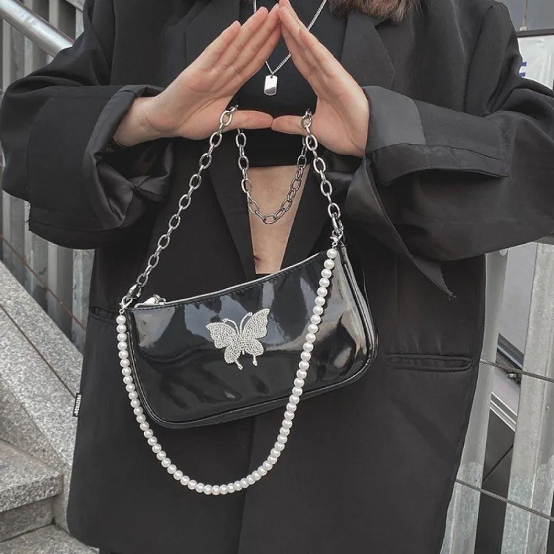 Rich Bish Butterfly Purse sold by Empty Soda