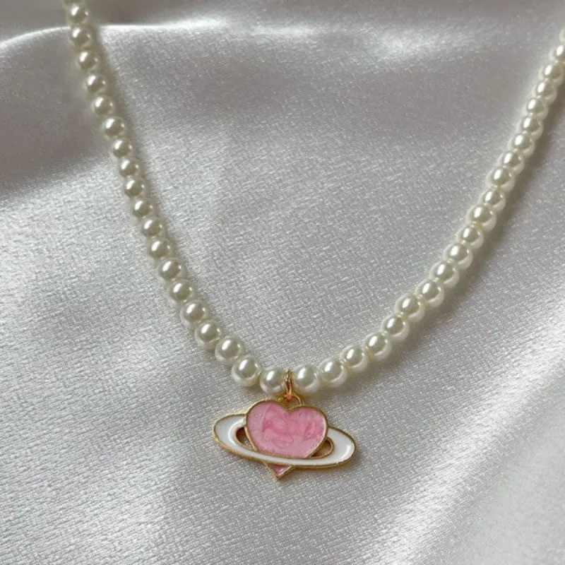 Planet Of Love Necklace sold by Empty Soda
