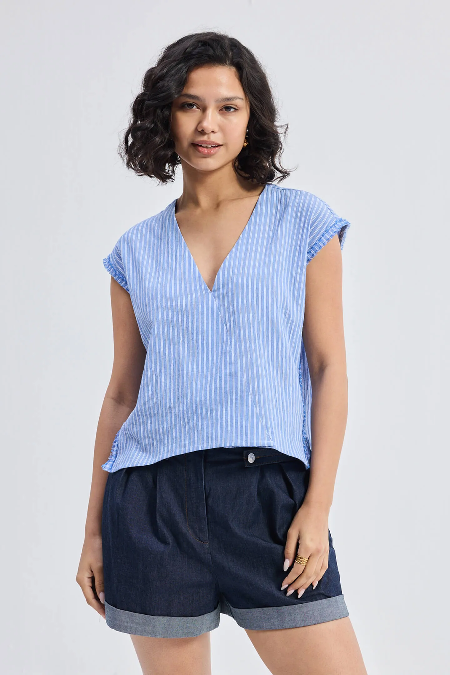 Boxy V-neck Top with Fray Detail sold by Reistor