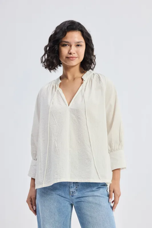 Relaxed Fit Top with Front-tie in Cream sold by Reistor