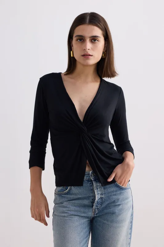 Twist Front Knit Shirt in Black sold by Reistor