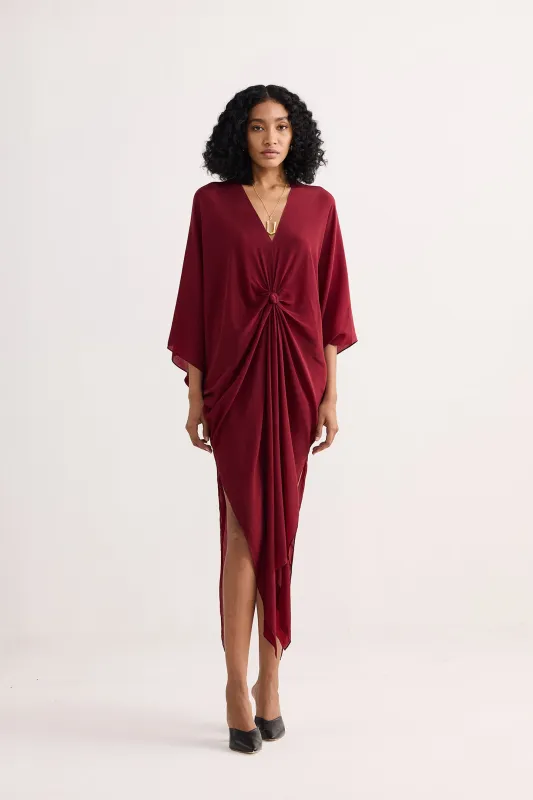 Front Twist Kaftan Dress in Burgundy sold by Reistor