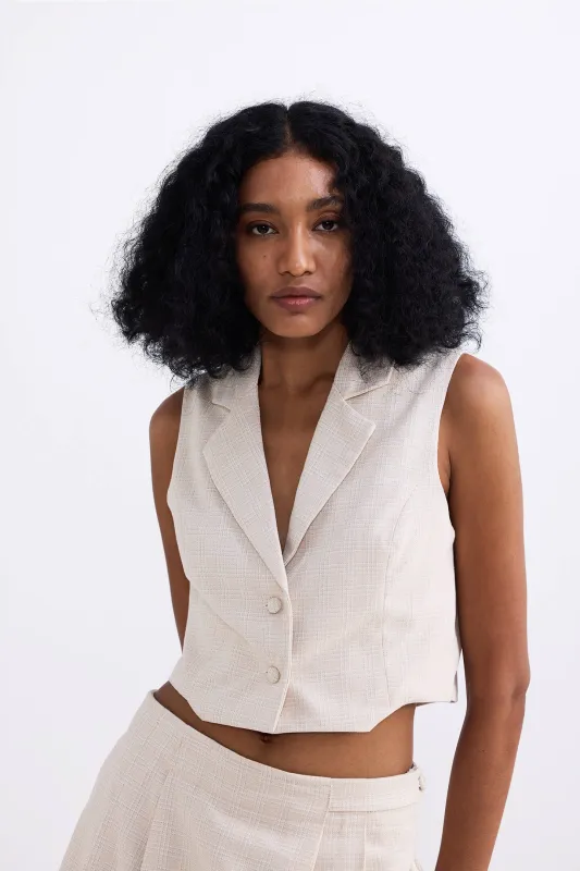 Cropped Cotton Tweed Vest in Cream sold by Reistor
