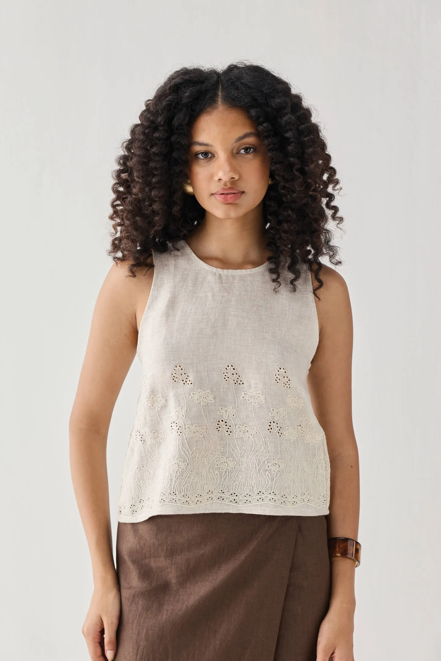 The Embroidered Button Back Top in Checkered Linen sold by Reistor