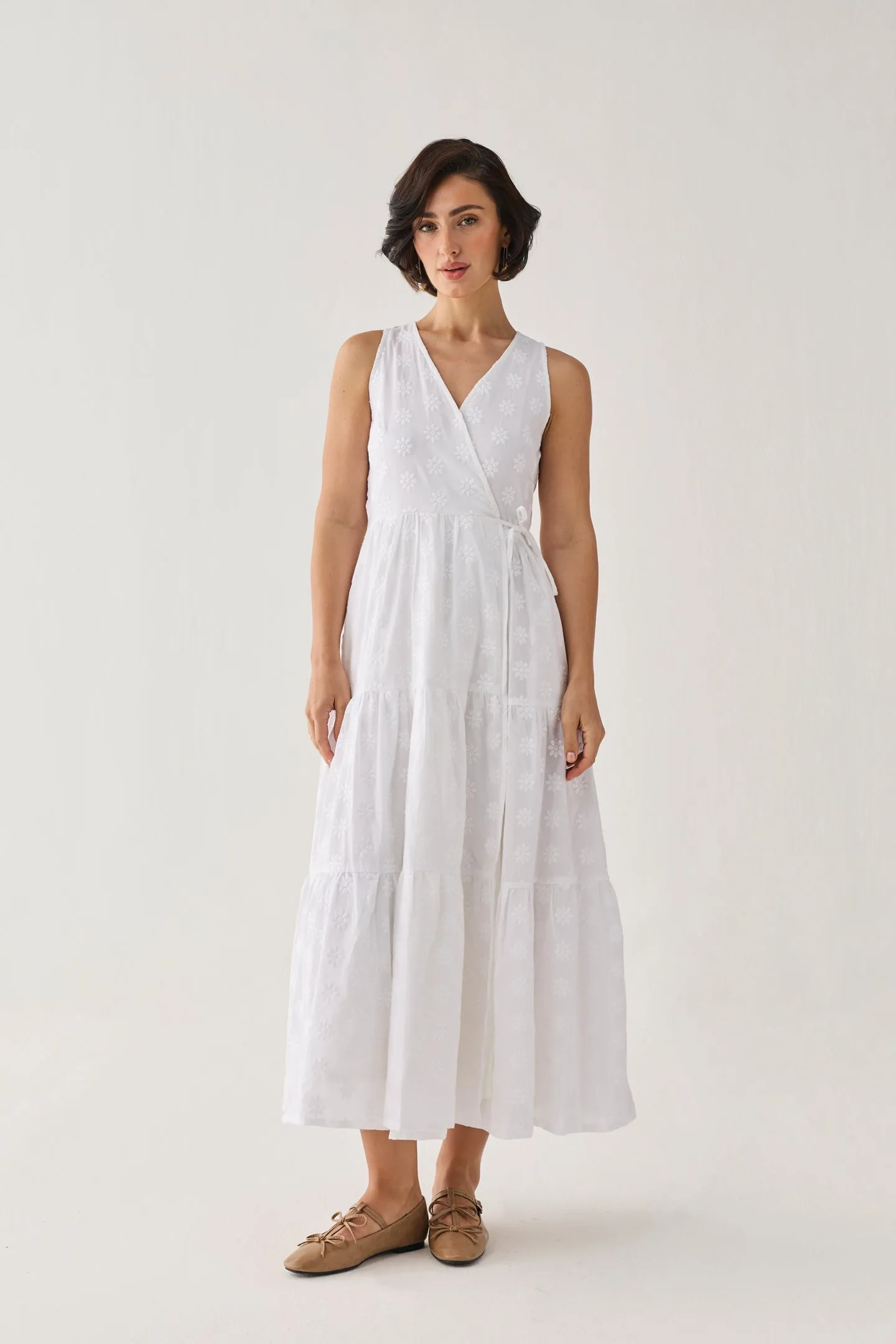 The Embroidered Tiered Wrap Maxi Dress sold by Reistor